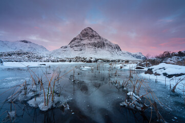 sunrise in the mountains known as Glencoe, Highlands, Scotland.