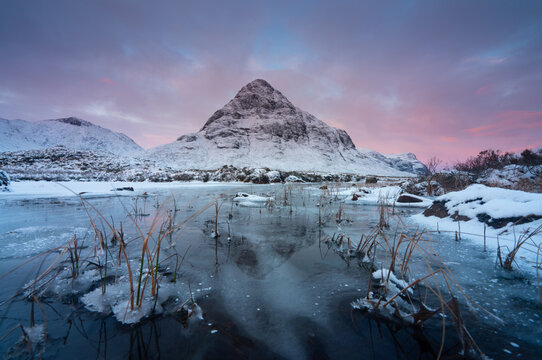 sunrise in the mountains known as Glencoe, Highlands, Scotland.