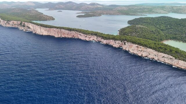 Incredible aerial drone footage over Tela&scaron;ćica Nature Park and the stunning Slano Jezero salt lake, capturing breathtaking coastal landscapes and pristine nature on the Adriatic coast of Croatia.	