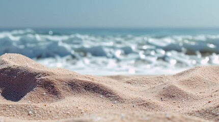 close-up of beach sand with ocean foam in background, perfect for spa product promotions, travel blog headers, summer-themed advertisements, or nature textures
