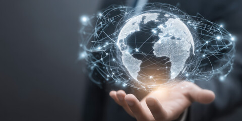 Businessman presents digital Earth hologram symbolizing global connectivity in a tech setup