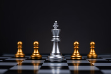 Leader, business strategy and planning concept, Silver chess king figure on chessboard