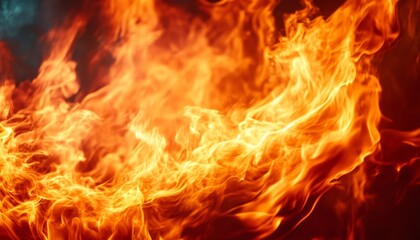 Obraz premium Intense Flames Erupting from a Fiery Inferno, Illuminating the Darkness with a Blazing Orange Glow