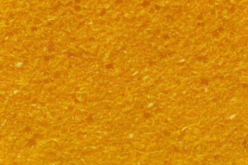 Close-up view of homemade frozen orange mousse background texture. Flat lay.