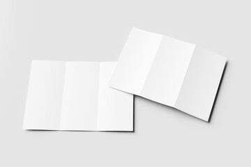Two blank white tri-fold brochure mockups, slightly overlapping on a light gray background. One is...