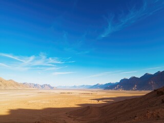Vast Desert View with Sunny Blue Sky