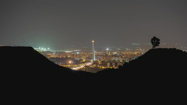 Night Timelapse of Puente del Alamillo with Seville Skyline and Airport in the Background