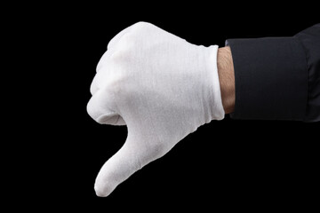 White gloved hand making thumbs down gesture isolated over black