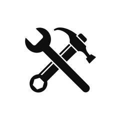 Black silhouette of a hammer and wrench crossed isolated on white background