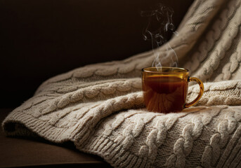 Close-up of hot beverage cup on handmade crochet textile