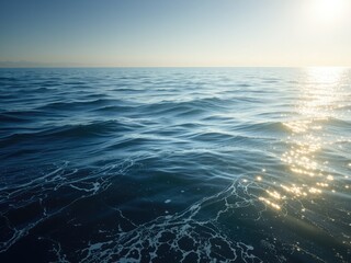 Tranquil Seascape: Sparkling Sunlight on Gentle Waves