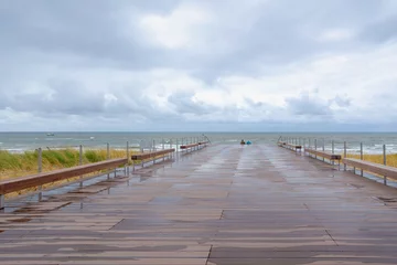 Photo sur Plexiglas Wooden bridge walk and stair to the sand beach with marram grass (beach grass) under blue sky in summer, Dutch north sea coastline in Egmond aan Zee, Municipality of Bergen, Noord Holland, Netherlands
