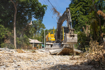 dismantling, reconstruction of a concrete highway by an excavator