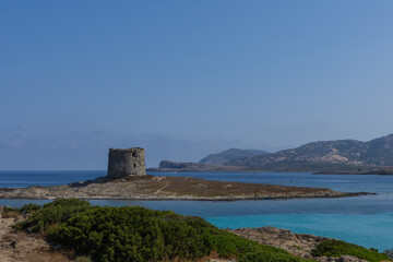beautiful view of ruined tower on la pelosa beach sardinia italy