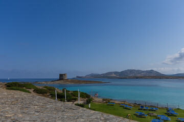 beautiful view of ruined tower on la pelosa beach sardinia italy