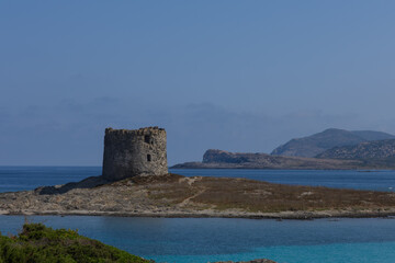 beautiful view of ruined tower on la pelosa beach sardinia italy