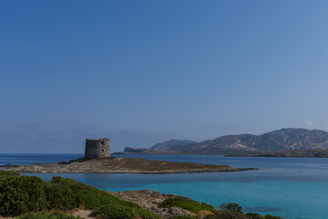 beautiful view of ruined tower on la pelosa beach sardinia italy