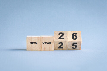 New year turn from 25 to 26. Square wooden blocks to depict change of new year. 