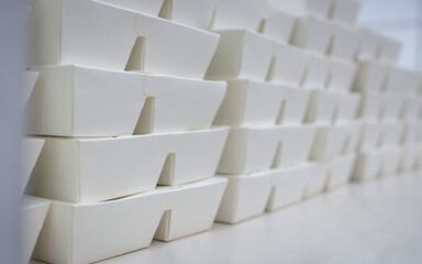 Stacked White Cardboard Lunch Boxes 