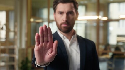 Caucasian business man confident guy middle-aged businessman serious hand stop gesture displeased...