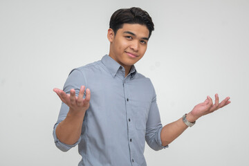 Young Asian man expressing calm disagreement acceptance