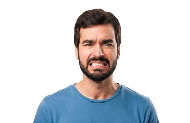 Obraz premium Bearded young man clenches teeth, fists curled in frustration, dressed casually, expressing regret and emotional tension on white background