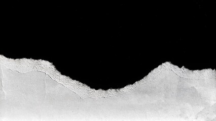 Rough and soft white torn paper pieces isolated on black background. Space for text, space for...