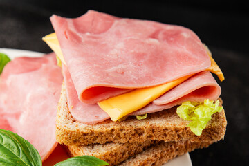 Sandwich ham, cheese, bread toast meat spam fresh delicious gourmet food background on the table rustic food top view copy space