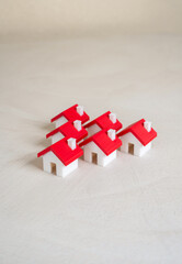 Group of figurine houses. Real estate and housing. Affordable housing, population density, or...