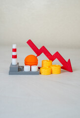 Power company and red arrow pointing down. Worsening of the economic situation of the enterprise....