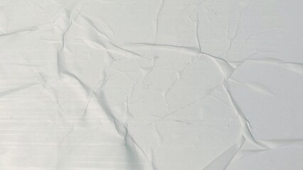 White wrinkled and crumpled paper texture glued as background. Abstract background. Space for advertising copy, space for copy text.