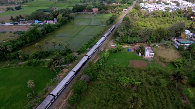 Aerial Drone Shot of Train Passing Through Villupuram City