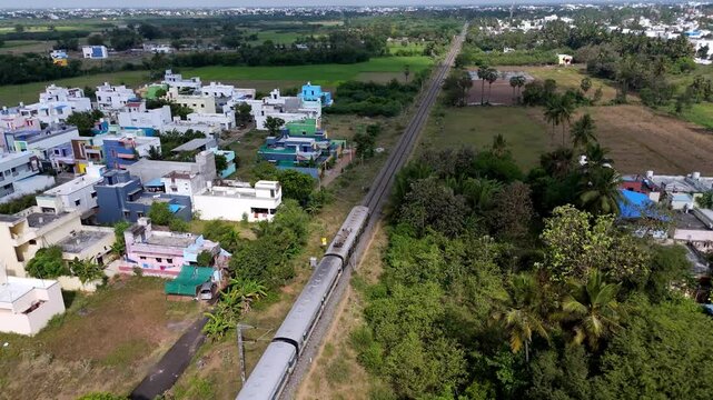 Railways converging at Villupuram Junction showing platforms and parked trains