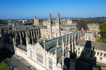 Aerial view of the spires and rooftops of 'Hertfield College' in the city of Oxford