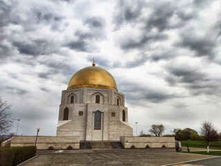 Golden dome of the Bolgar Historical and Architectural Complex under a dramatic sky in Bolgar,...