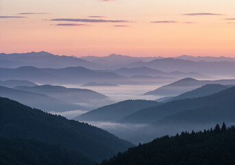 Obraz premium Misty Layered Mountain Range at Dawn with Soft Pastel Sunrise Light