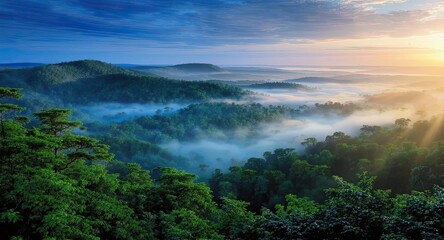 Lush green mountains stretch across a misty valley at sunrise, with soft golden rays piercing the fog under a vivid blue sky – AI Generated Digital Art