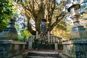 Mitoyo, Kagawa prefecture, Japan - April 13, 2018: Bronze statue of Kobo Daishi on the grounds of Iyadaniji, temple number 71 of Shikoku pilgrimage