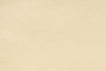 Beige fine pebbled leather texture pattern as background