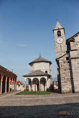 Historic baptistery standing prominently in Baveno, showcasing elegant Romanesque design with...