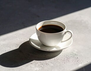 Elegant White Coffee Cup On Gray Surface Under Sunlight