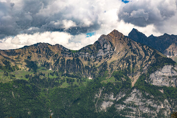 Switzerland, Swiss Alps, Canton St. Gallen, Churfirsten group, mountain range, summer 2025. Clouds,...