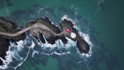 Aerial view of lighthouse on cliffs and coastline, France. - Powered by Adobe