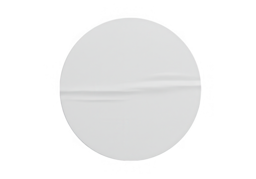 A single white round paper sticker with a subtle wrinkle, isolated on white, ideal for product labeling isolated on transparent background