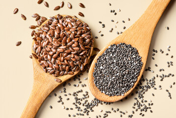 Flaxseeds and chia seeds on spoons