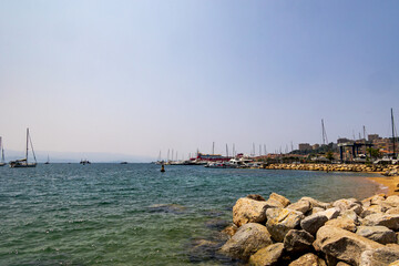 View of Ajaccio marina with sailing boats and rocky shore, France, Corsica, Ajaccio, 13 June 2025