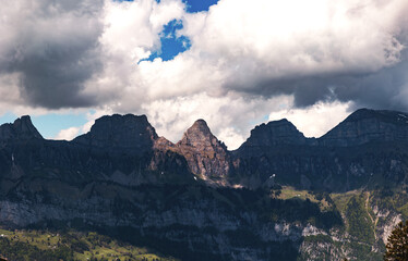 Switzerland, Swiss Alps, Canton St. Gallen, Churfirsten group, mountain range, summer. Cloud, sun,...