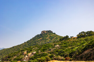 Mediterranean hill with rocky summit and green slopes, Corsica, 13 June 2025