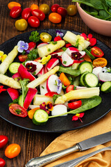 Asparagus salad with flowers.