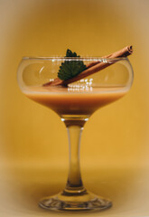 glass of liqueur with berries